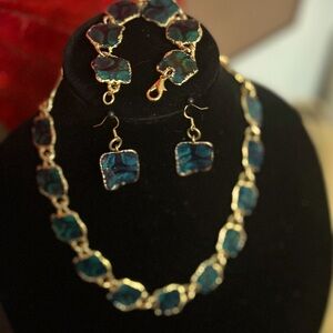 Beautiful, dark green and bright gold necklace, earrings, and bracelet set